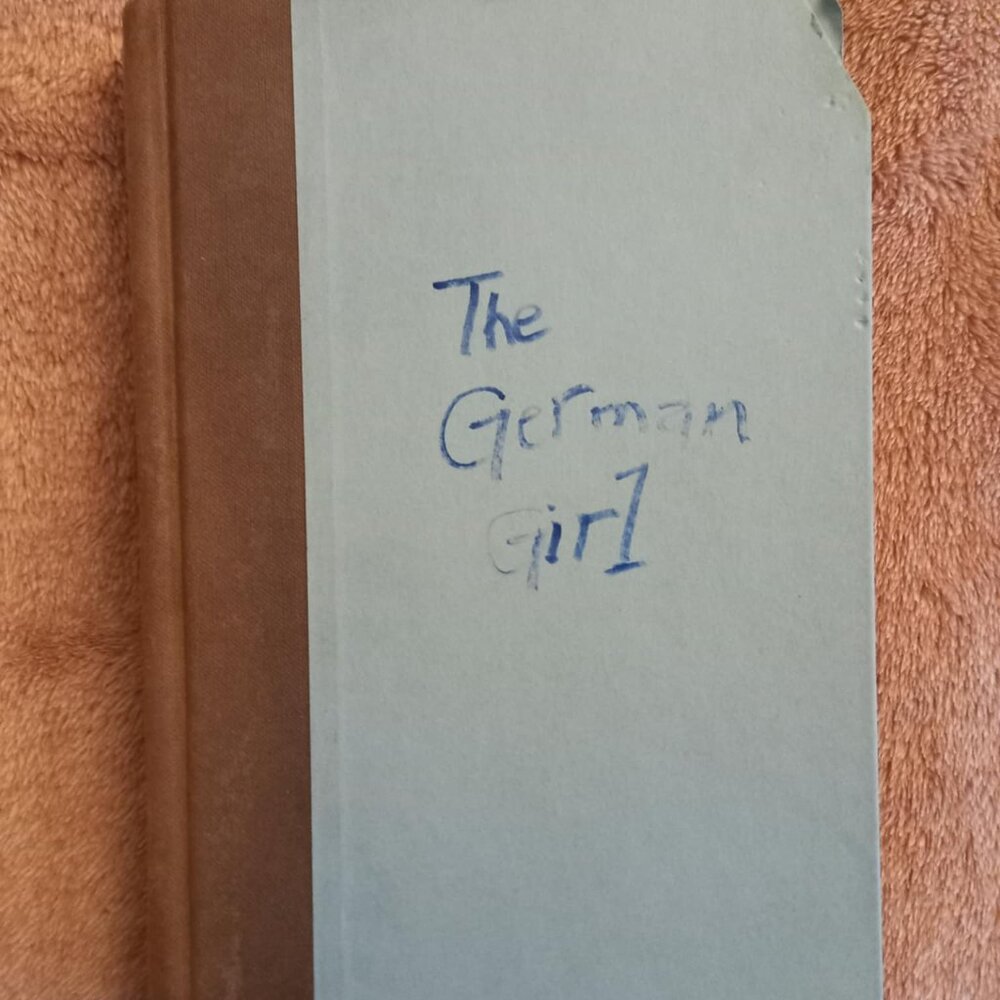 The German Girl book - hard cover - used/good condition